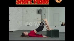 'Fitness Woman Doing Banded Glute Bridge Exercise'