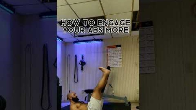 'How To Engage Your Abs More: Lower Leg Raises #shorts #fitness'