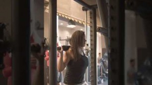 'Hot Girl #workout #gym #fitness # Woman Exercising on a Smith Machine #youtubeshorts #viral #shorts'