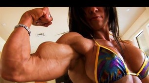 'Perfect Fitness Muscle Woman flexing her strong ripped biceps'