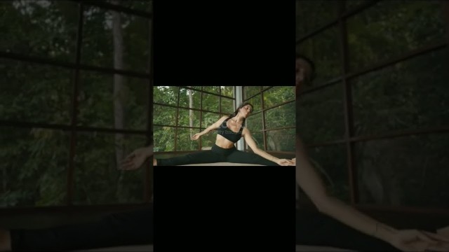 'Woman practicing yoga 