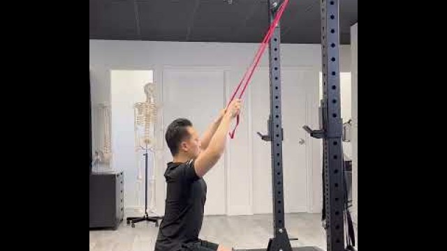 'Banded Lat Pulldown - home exercise to engage the Latissimus Dorsi muscle'