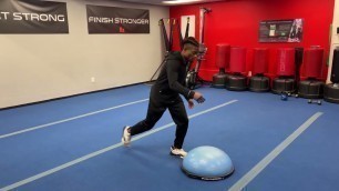 'Fitness Rx Exercise Library: How to do a Reverse Lunge + Power Skip with a BOSU Ball'