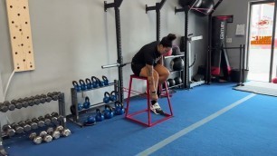 'Fitness Rx Exercise Library: How to do a Leg Extension with Resistance Bands'