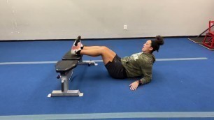 'Fitness Rx Exercise Library: How to do an Elevated Bridge + Psoas March'