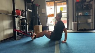 'Fitness Rx Exercise Library: How to do a Reverse Crunch with Resistance Bands!'