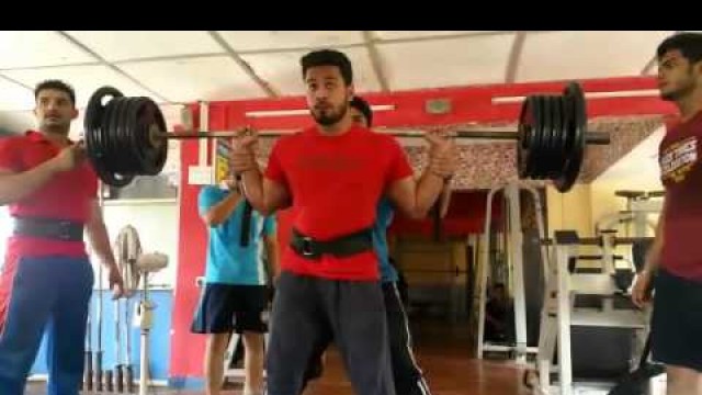 'Fitness Paradise - Trainer Fahad Khan squats'