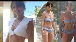'Davina McCall, 52, looks incredible as she flaunts abs in \'final bikini shot\' of the year... after u'