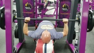 'Bench pressing at Planet Fitness'