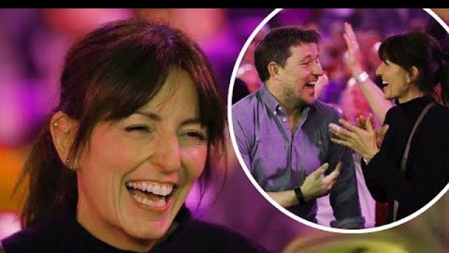 'Davina McCall giggles at darts following loneliness claim'