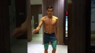 'Men\'s physique posing Mongolian fitness model ED Tamir'