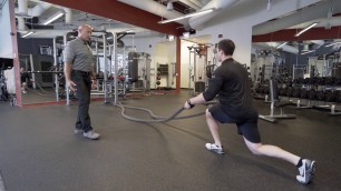 'Battle Rope Lunge w/ Side Waves | Life Fitness Group Training'