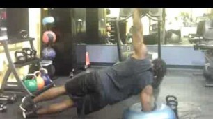 'SuperHero Fitness Owner CJ Washington Jr Doing Core Work'